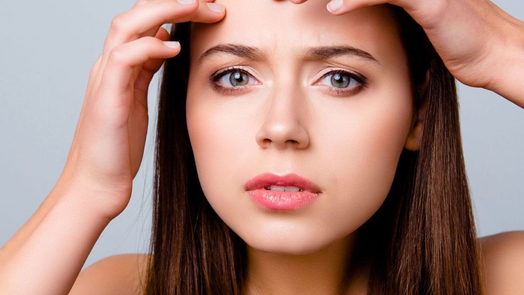 brufoli-sulla-fronte